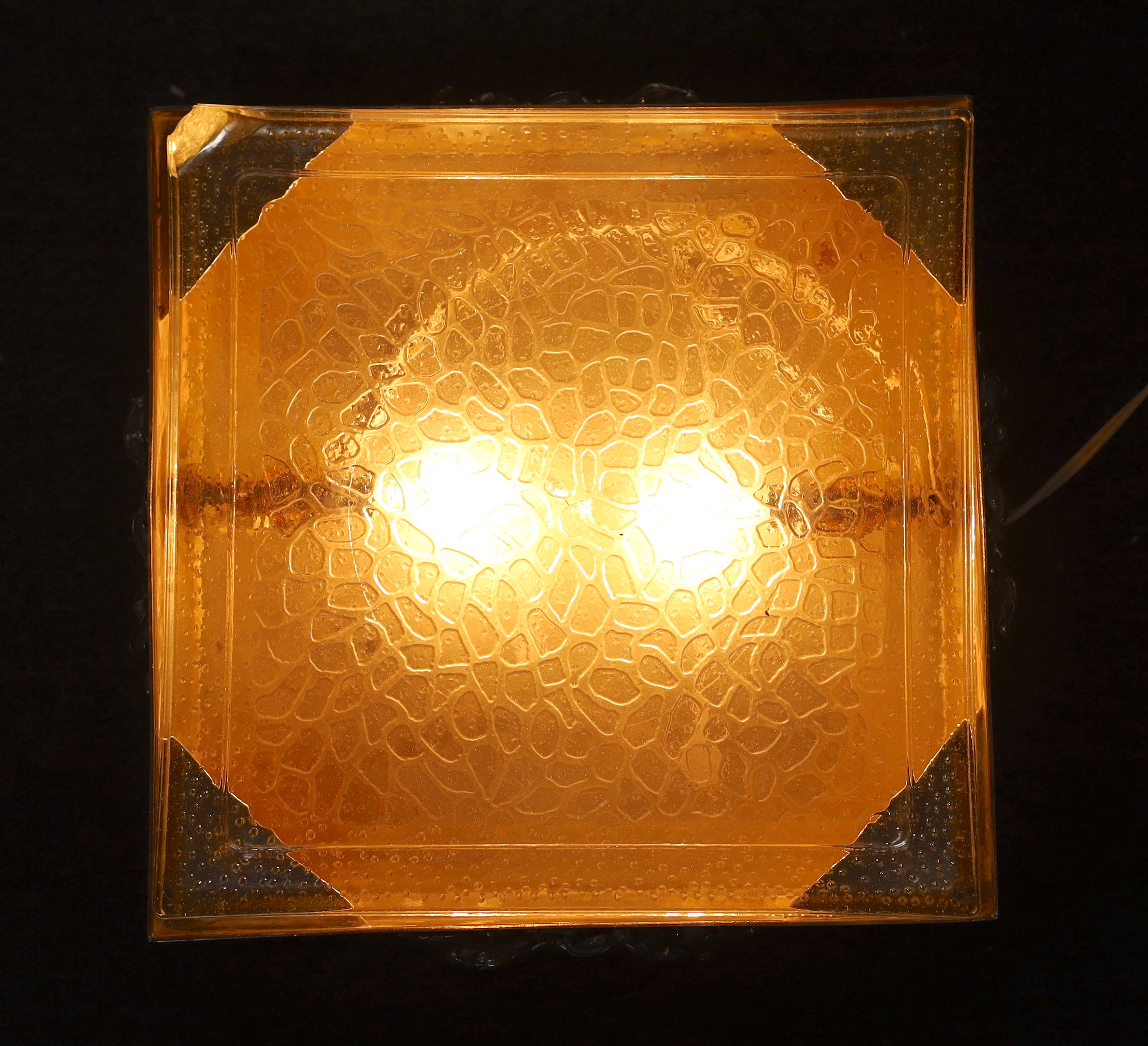 A plated and glass centrepiece table light, 31cm square
